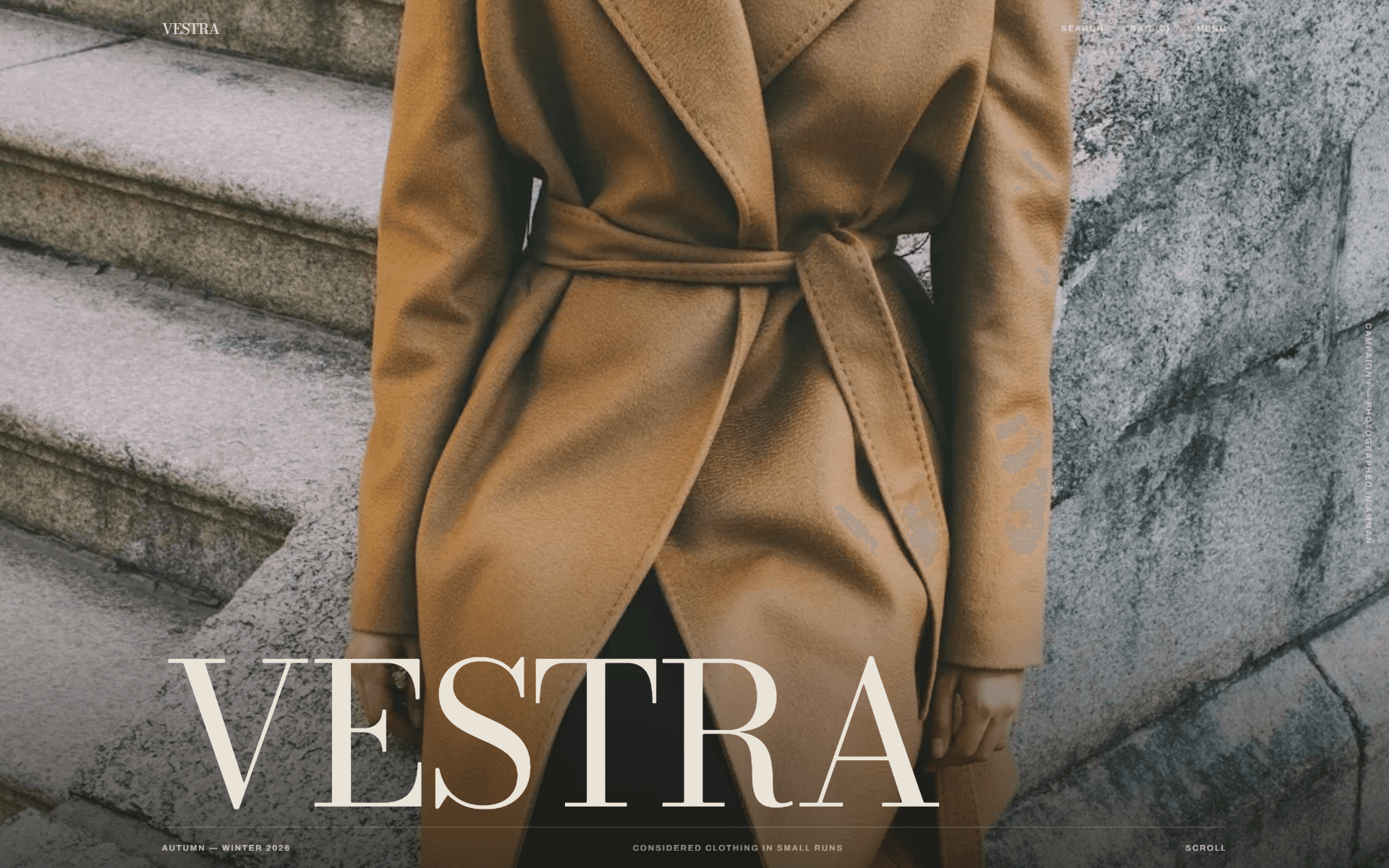 Vestra — homepage campaign hero over camel-coat photography